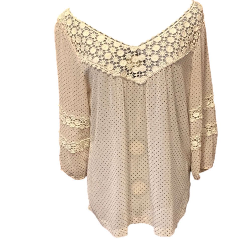 L’ AFFAIRE cream and black polka-dot blouse.
